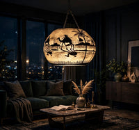 Ceiling Hanging Camel Skin Lamp - Desert Caravan glowing in a luxury living room